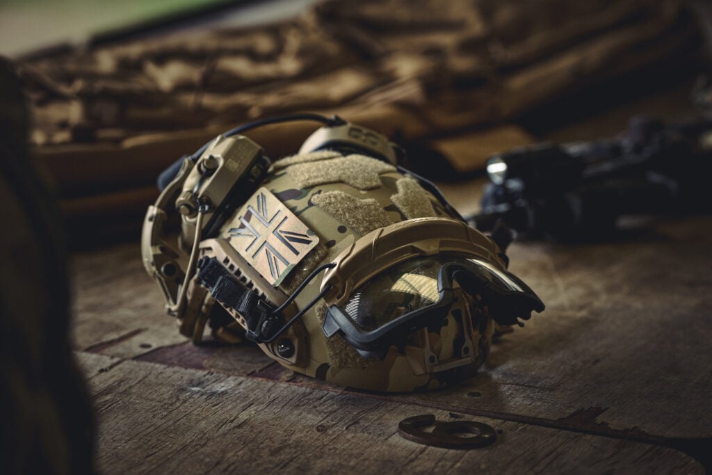 Modern combat helmet with tactical accessories representing integrated soldier protection and battlefield capability
